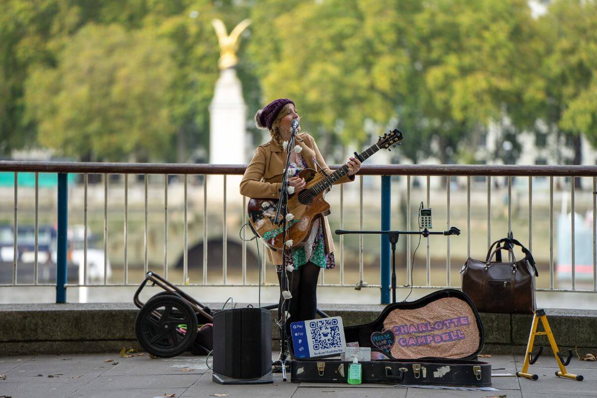 Charlotte Campbell performing on the street