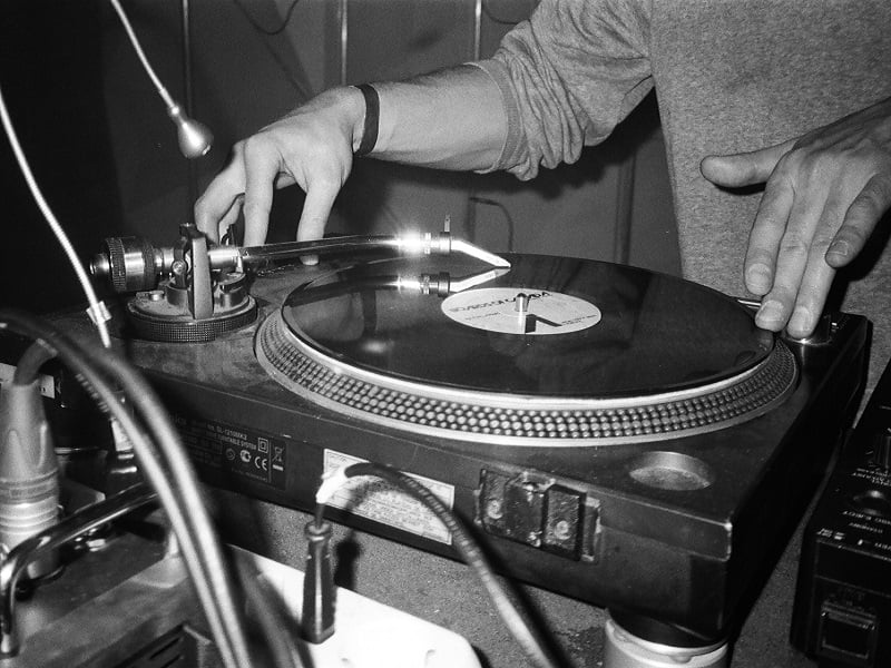 Vinyl record spinning on a turntable.