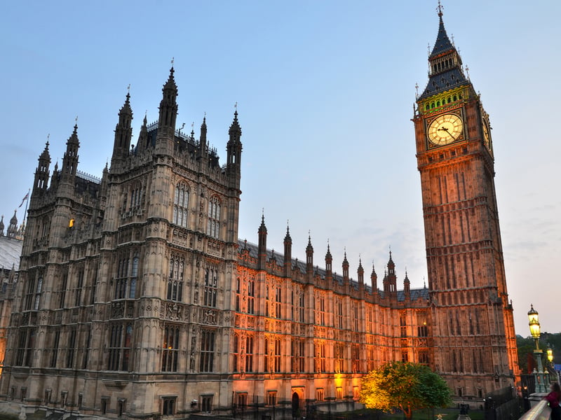 Photograph of the houses of parliament taken in the evening.